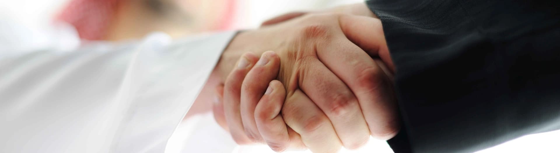 Close-up handshake symbolizing partnership