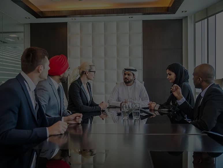 Business leaders collaborating around a conference table